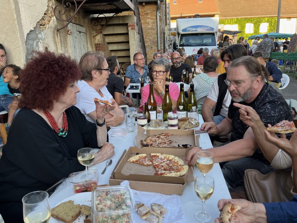 shared pizza at the market in Collonges